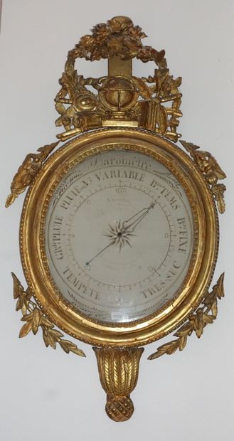 Baromètre ovale en bois doré, Louis XVI.

Cadran...
