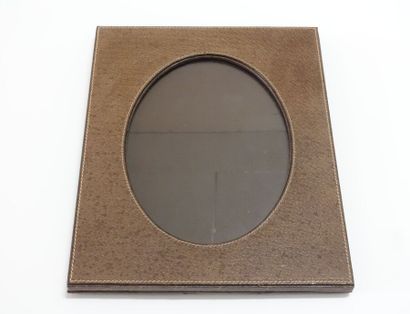 GUCCI.

Rectangular leather table frame,...