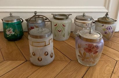 A collection of seven cookie jars made of...