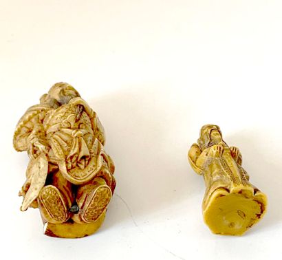 A netsuke and an okimono.

High. : 4 and...