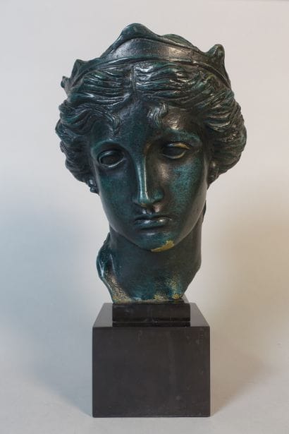 Face in ruler with green patina.

(Wears.)

Base.

Top....