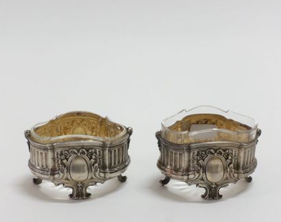 Pair of salt shakers and salt shovels in...