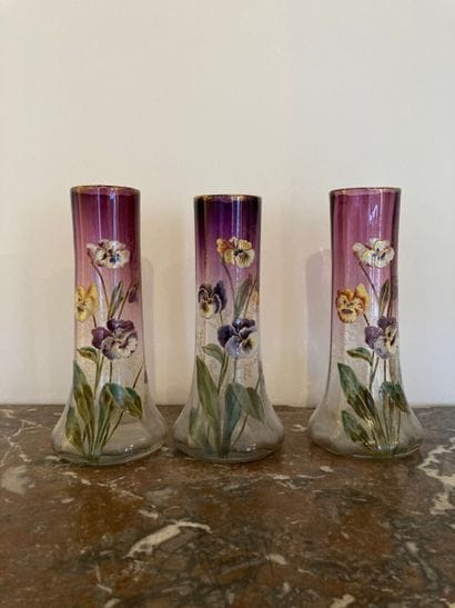 Meeting of three enamelled glass vases with...