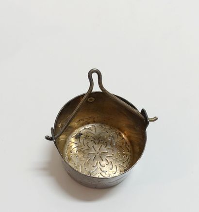 Silver cup and saucer with Celtic sword motifs....