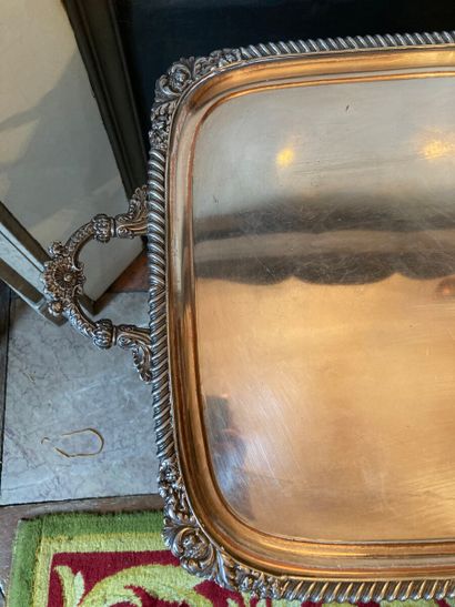 Lined metal tray with a gadrooned edge, decorated...