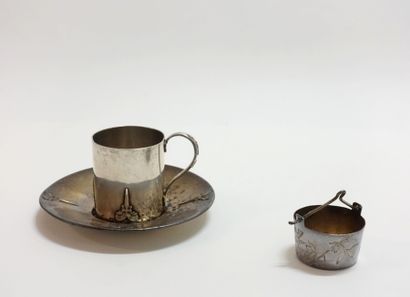 Silver cup and saucer with Celtic sword motifs....