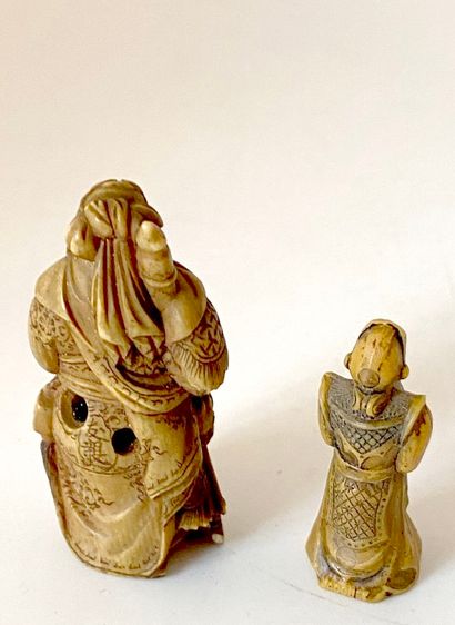 A netsuke and an okimono.

High. : 4 and...