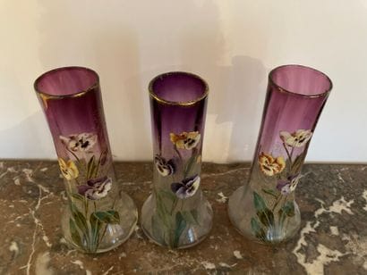 Meeting of three enamelled glass vases with...