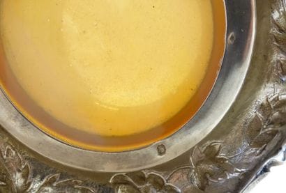 Cup with slightly flattened ovoid belly and...