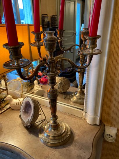 Pair of metal candelabra, formerly silver...