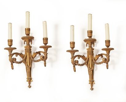 Pair of gilt bronze sconces with three arms...