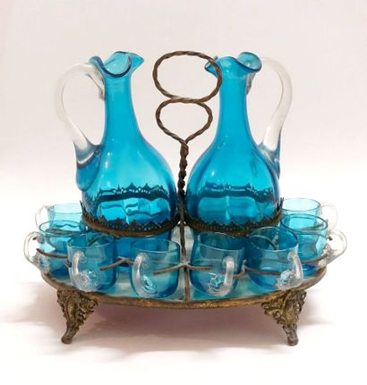 Small liquor set in blue tinted glass including...