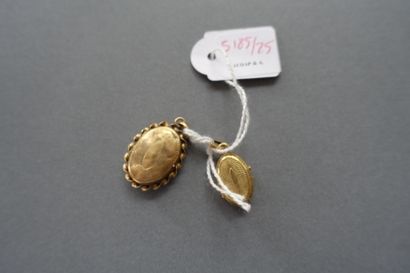 Two 750 thousandths gold medallion pendants.

Gross...