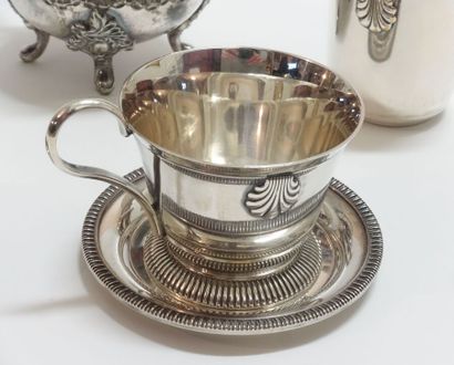 A set of silver plated metal objects comprising...