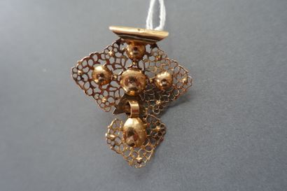 Openwork gold pendant decorated with small...