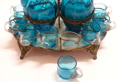 Small liquor set in blue tinted glass including...