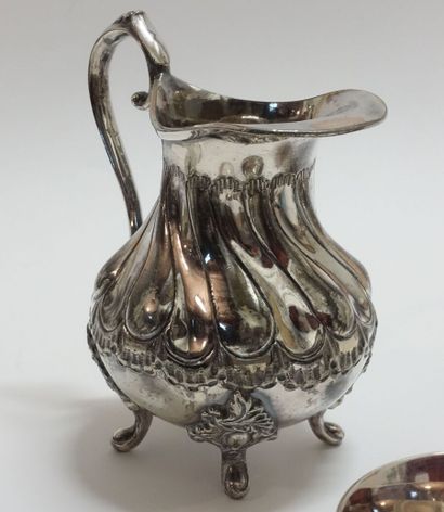 A set of silver plated metal objects comprising...