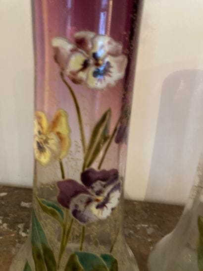 Meeting of three enamelled glass vases with...