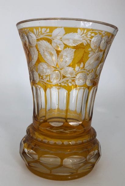 Translucent and yellow glass vase.

(Shine...