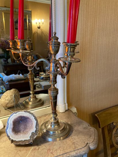 Pair of metal candelabra, formerly silver...
