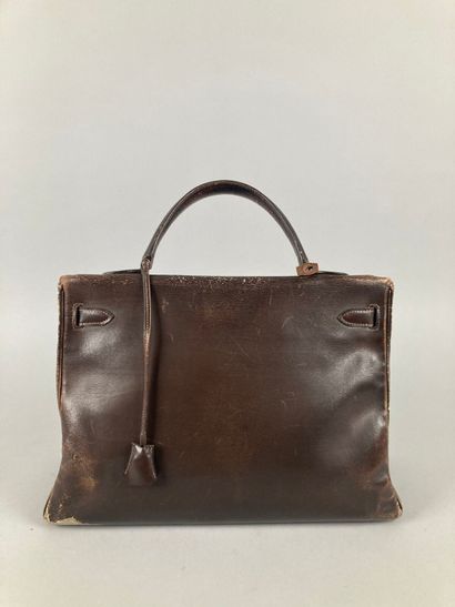 HERMÈS Paris
Sac Kelly 35 en box chocolat,...
