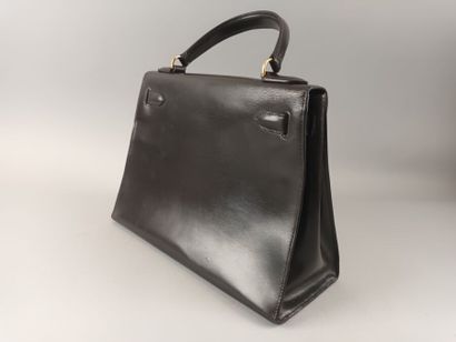 HERMÈS Paris 
Sac Kelly 29 en box marron,...
