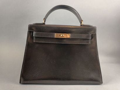 HERMÈS Paris 
Sac Kelly 29 en box marron,...