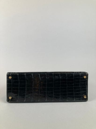 HERMÈS Paris
Sac Kelly 32 en crocodile noir,...