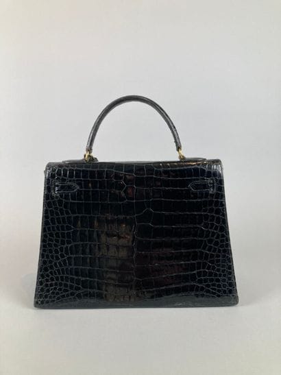 HERMÈS Paris
Sac Kelly 32 en crocodile noir,...
