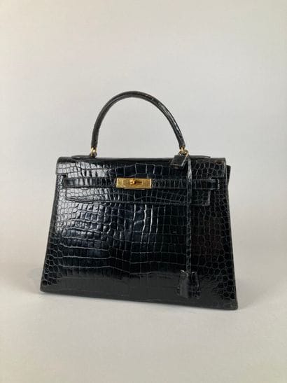 HERMÈS Paris
Sac Kelly 32 en crocodile noir,...