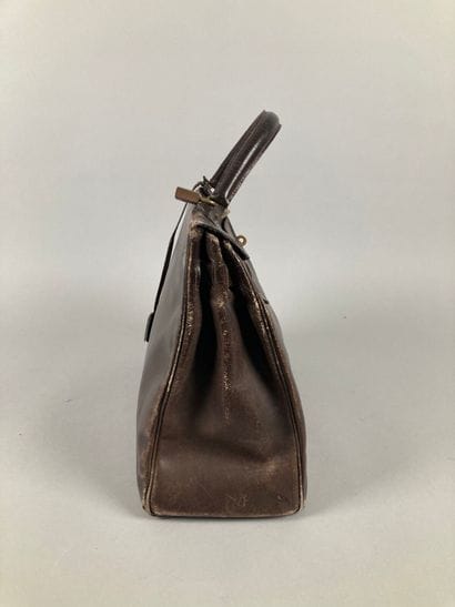 HERMÈS Paris
Sac Kelly 35 en box chocolat,...