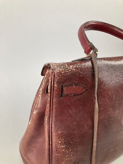 HERMÈS Paris
Sac Kelly 35 en box rouge, bijouterie...