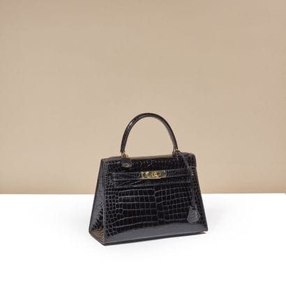 HERMÈS Paris
Mini Kelly 25 en crocodile noir,...