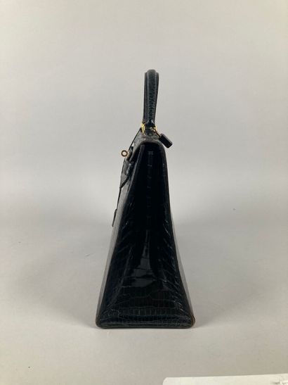 HERMÈS Paris
Sac Kelly 35 en crocodile noir,...