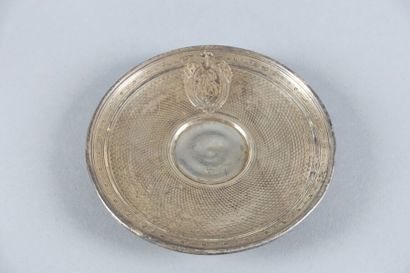 Tasse et sa sous-tasse en argent à décor...