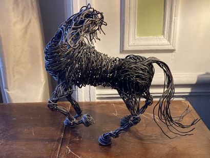 École moderne

Cheval

Sujet en fils métalliques

Haut....