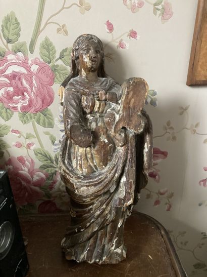 Vierge en bois sculpté anciennement doré

(Éclats,...
