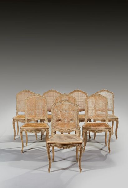 Suite de huit chaises cannées en bois mouluré,...