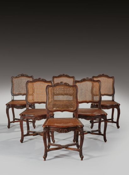 Suite de six chaises cannées en hêtre mouluré,...