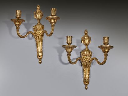Paire d'appliques en bronze doré à deux bras...