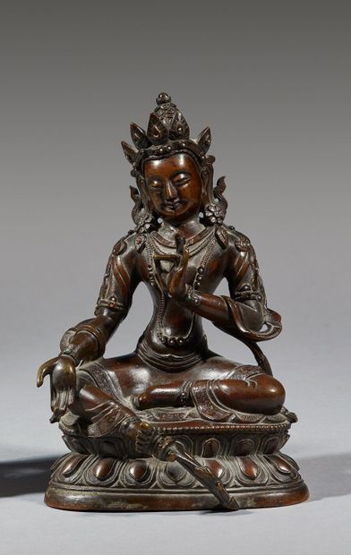 TIBET - XIXe siècle

Statuette en bronze...