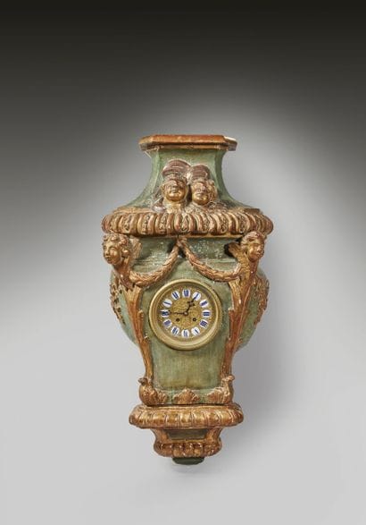 Élément de boiserie en noyer peint et doré,...