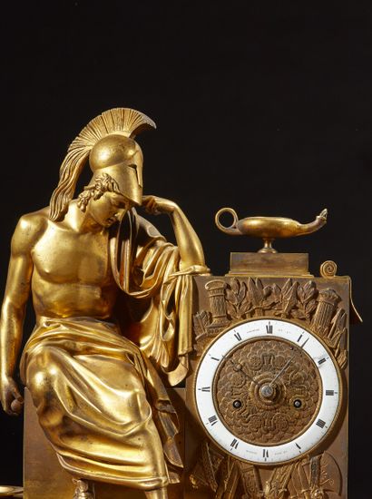 Pendule en bronze doré et marbre rouge griotte...