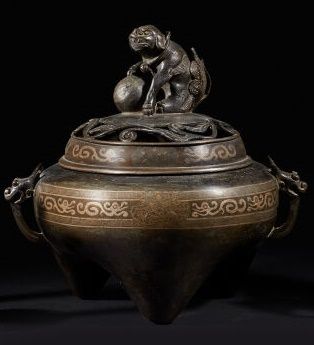 CHINE - Vers 1900

Brûle-parfum tripode en...