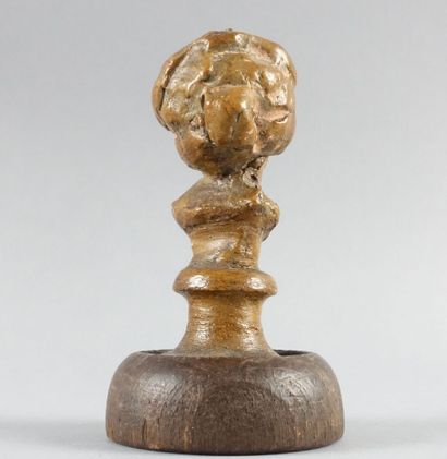 Petit buste d'enfant en terre cuite patinée...