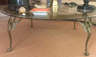 Table basse circulaire, le plateau en verre...