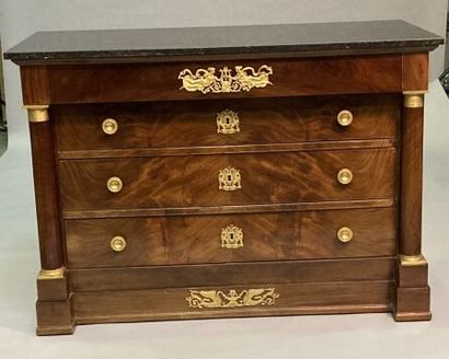 Flamed mahogany chest of drawers opening...