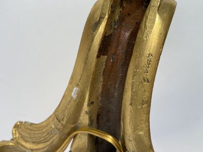 Pair of three-light gilt bronze sconces with...