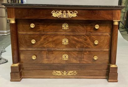 Flamed mahogany chest of drawers opening...
