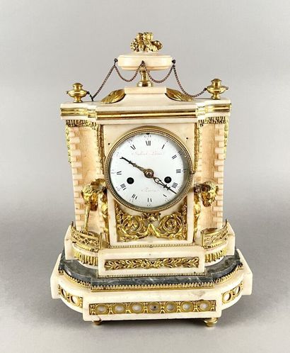 White marble and gilt bronze clock representing...